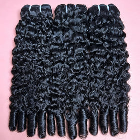 Xiaosa close-up of spiral ends highlighting defined curls and softness