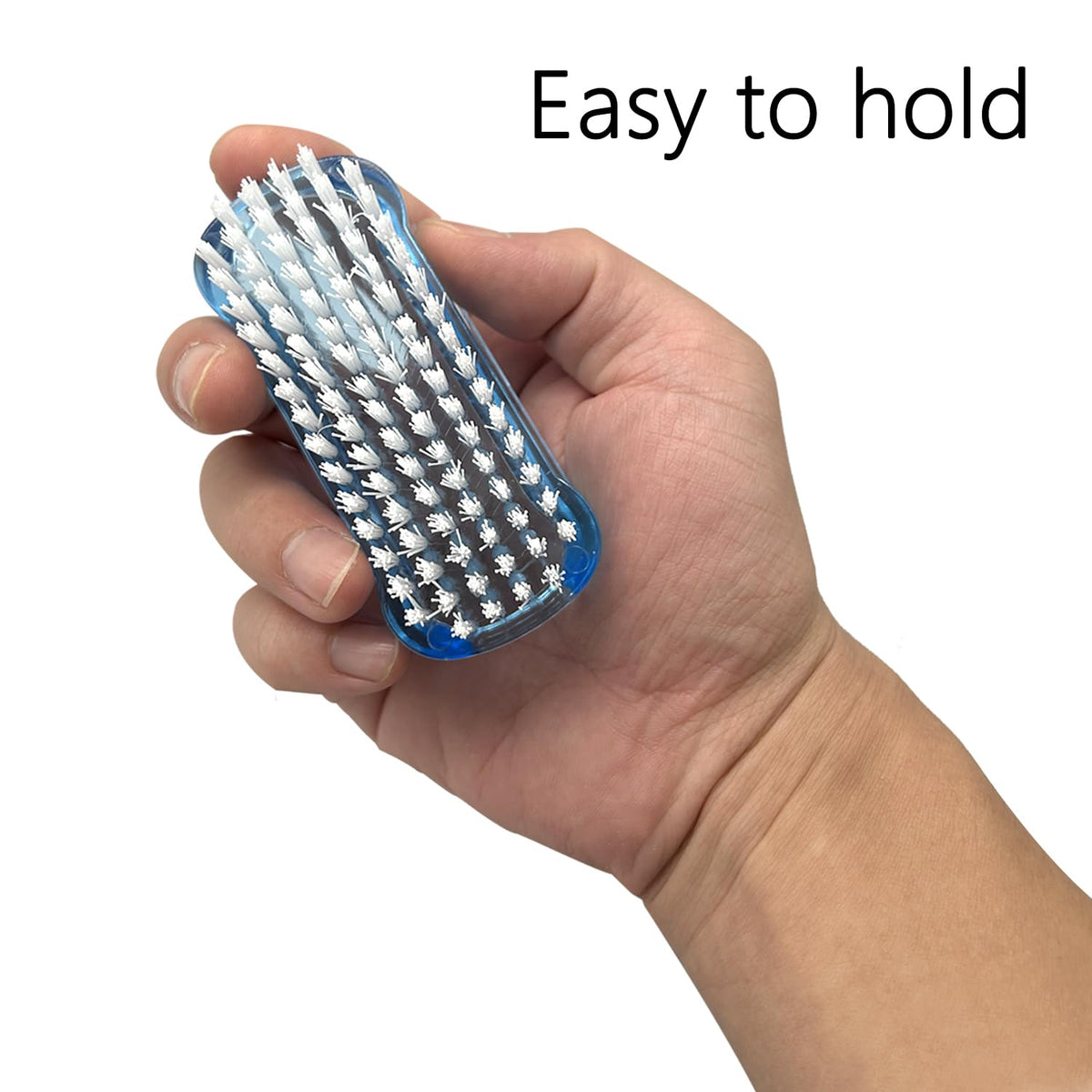 Xjinmin brush held in hand for scale showing portable size and travel convenience