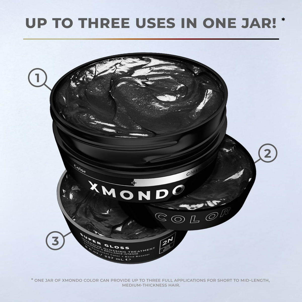 XMONDO bottle in hand to display 8 fl oz size and portability