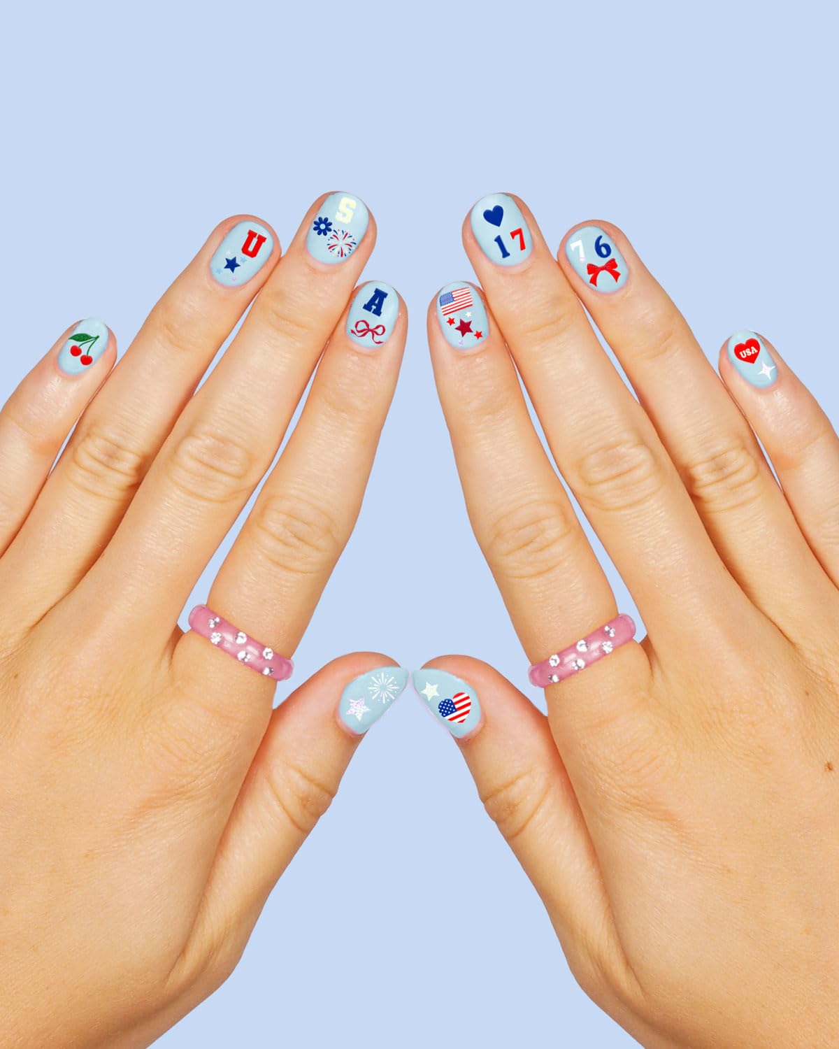 xo, Fetti application scene with tweezers and top coat for easy precise placement