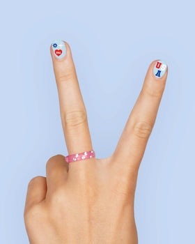 xo, Fetti group of friends using stickers at a party showing shareable supply