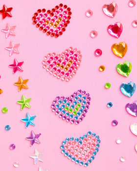 xo, Fetti close-up of heart and star gems highlighting sparkle detail