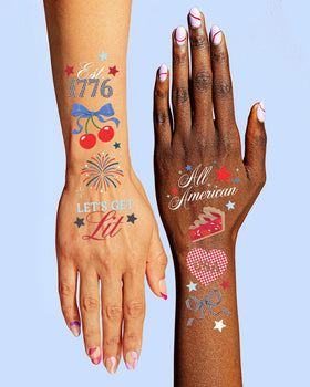 xo, Fetti child smiling wearing stars and fireworks temporary tattoos