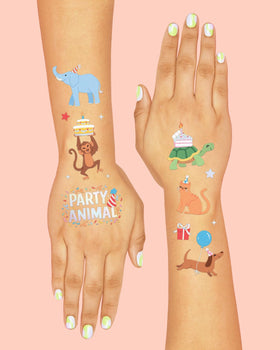 xo, Fetti kids wearing assorted animal tattoos enjoying party photos and smiles