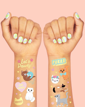 xo, Fetti metallic glitter finish on tattoos highlighting shimmer