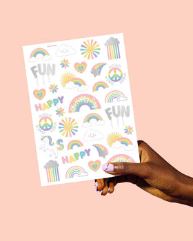 xo, Fetti tattoo sheet shown next to hand for accurate size reference