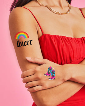 xo, Fetti tattoo next to a hand for scale highlighting small wearable size