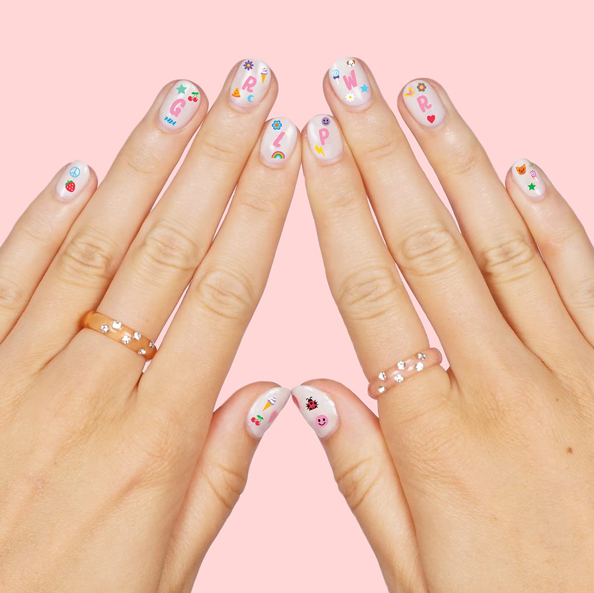 xo, Fetti stickers applied on polished nails demonstrating quick, cute results