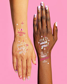 xo, Fetti tattoo applied to ring finger showcasing bridal look and photo-ready finish