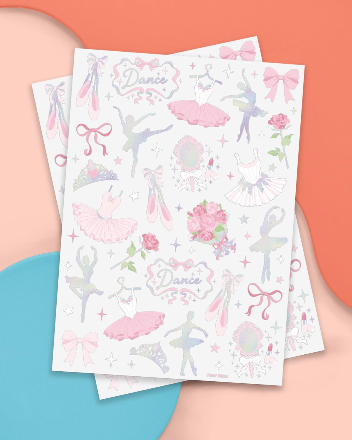 xo, Fetti two tattoo sheets laid flat showing variety of tiaras, tutus, dancers