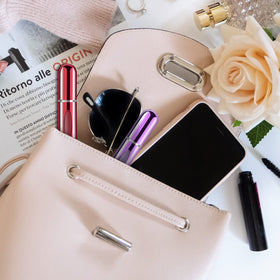yamadura in purse lifestyle image shows discreet carrying and odor protection