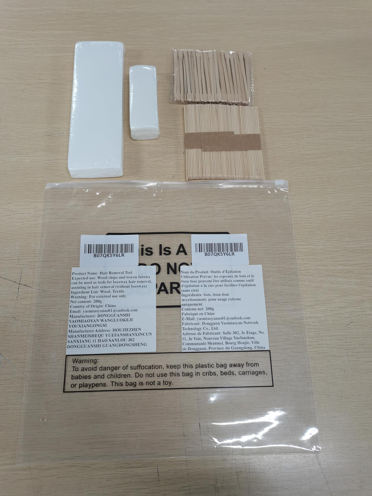 Yaomiao in-use wax application with stick demonstrating easy spreading and accurate placement