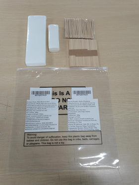 Yaomiao in-use wax application with stick demonstrating easy spreading and accurate placement