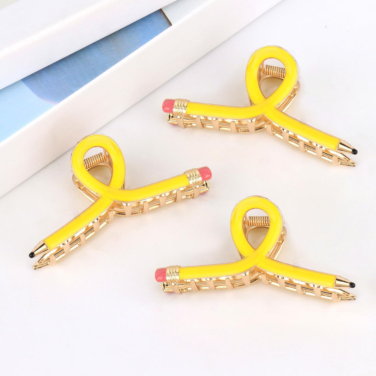 YARIEW pencil clip beside a ruler showing compact size and easy portability benefit