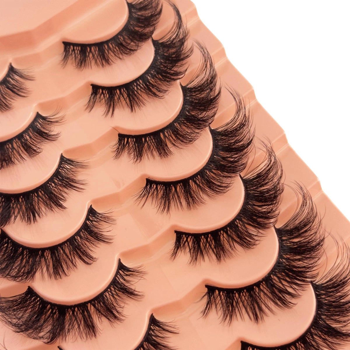YASNAI lash trimmed on scissors to fit eyelid for custom, precise fit