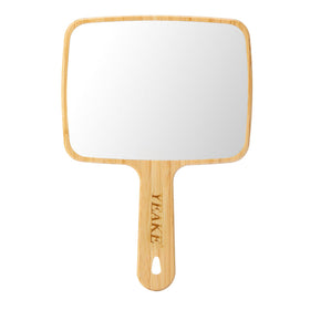YEAKE front view of handheld bamboo mirror showing clean edges and handle benefit portability