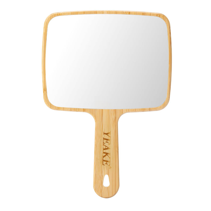 YEAKE front view of handheld bamboo mirror showing clean edges and handle benefit portability