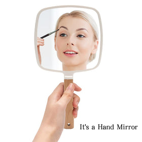 YEAKE hand mirror slim side profile showing thin lightweight portable frame