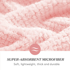 YFONG towel fully spread on bed demonstrating generous 26.3x40 size