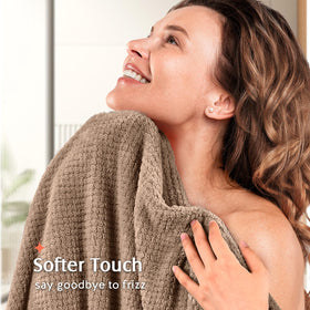YFONG towel wrapped on woman, illustrates secure fit and hands-free drying