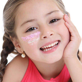 YGQQOY applied on cheek for festival look demonstrating durable, non-itchy hold