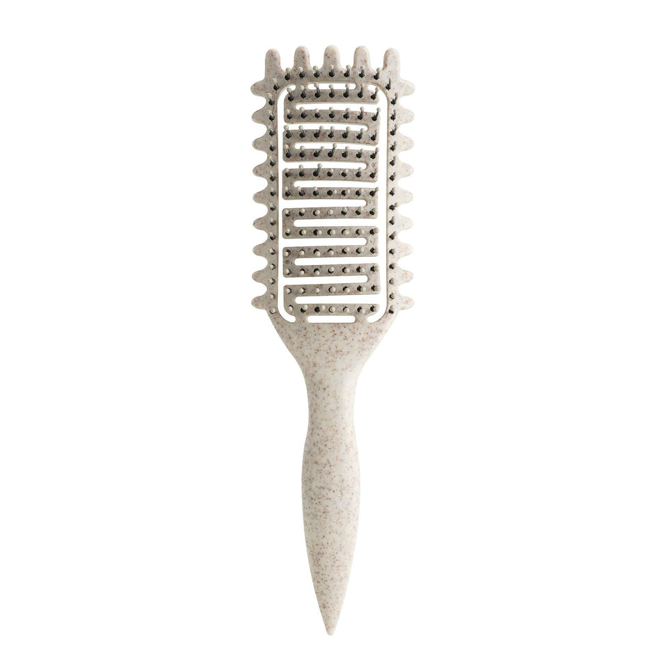 Yingbtr brush front view showing beige curved shape and ergonomic grip for comfortable styling