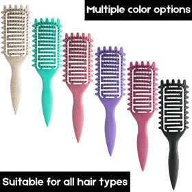 Yingbtr brush held in hand to show scale and ergonomic grip for comfortable styling
