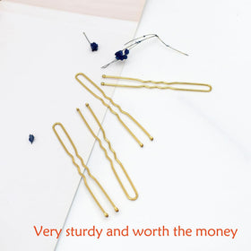 YINGFENG gold u-pins used in a bridal updo for polished, long-lasting hairstyle