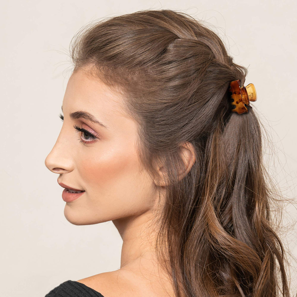 YOHAMA clip holding bangs in place illustrating gentle everyday hold