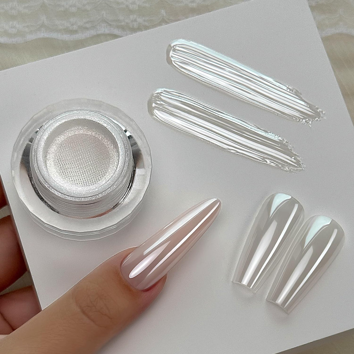 YOKEFELLOW finished polished nails in lifestyle shot emphasizing luminous pearly glow