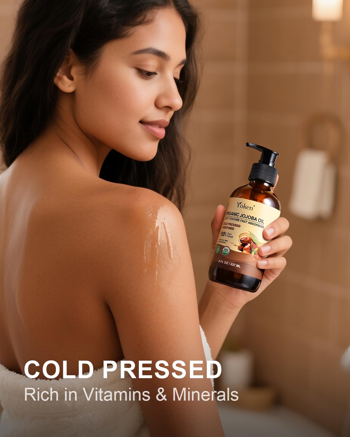 Yoken jojoba applied to hair ends improving shine and frizz control benefit
