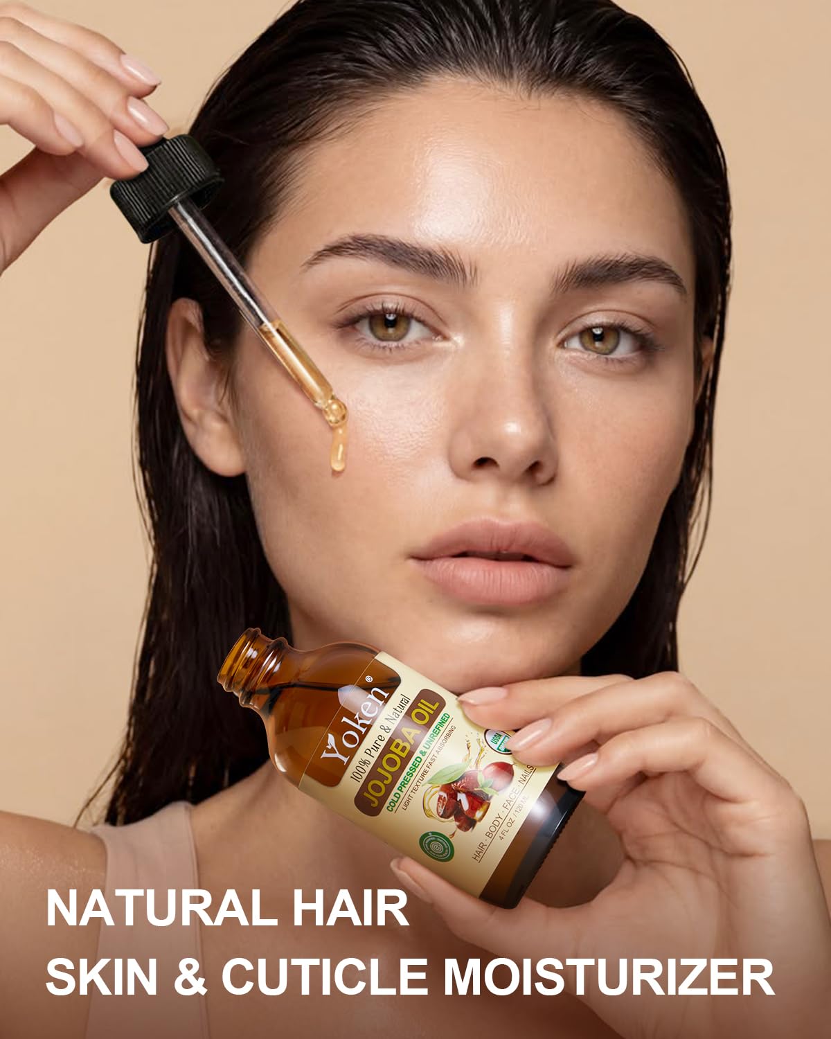 Yoken brush bottle applied to cuticles for softer nails and hydrated skin