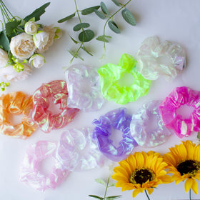 Yomwig party lifestyle setting with wearers wearing glowing scrunchies for fun