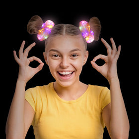 Yomwig scrunchie in ponytail demonstrating secure hold and night visibility