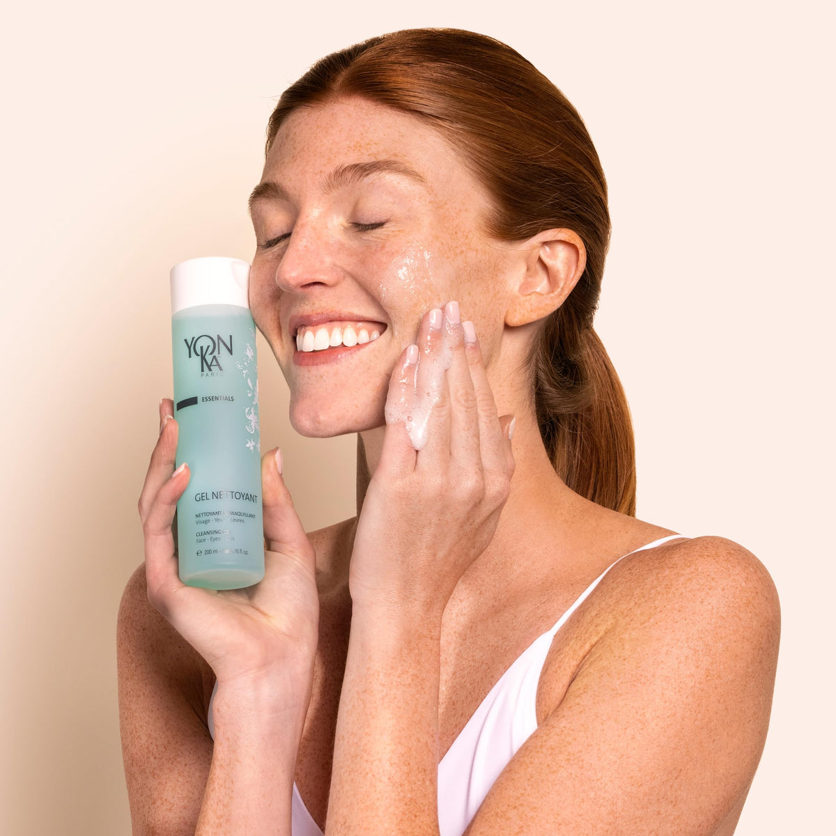 Soft lather on hand from Yonka gel cleanser illustrating mild foaming and gentle clean