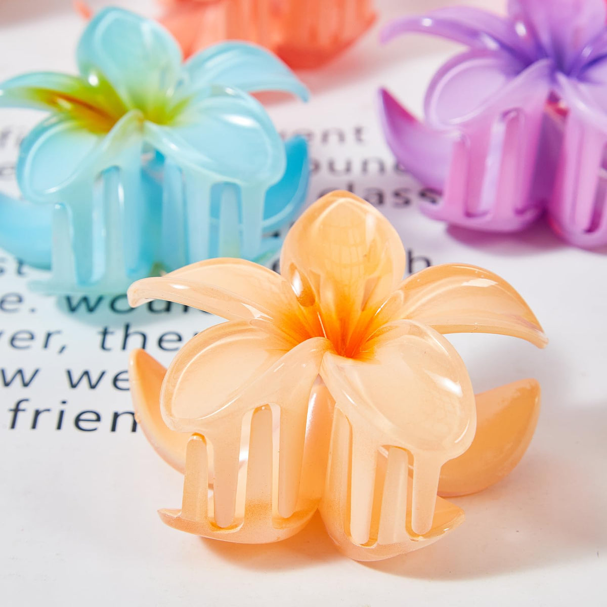 YosaiHom clips styled in a bun on model illustrating secure hold and tropical look