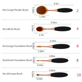 Yoseng brushes in hand to show scale and travel-friendly sizing