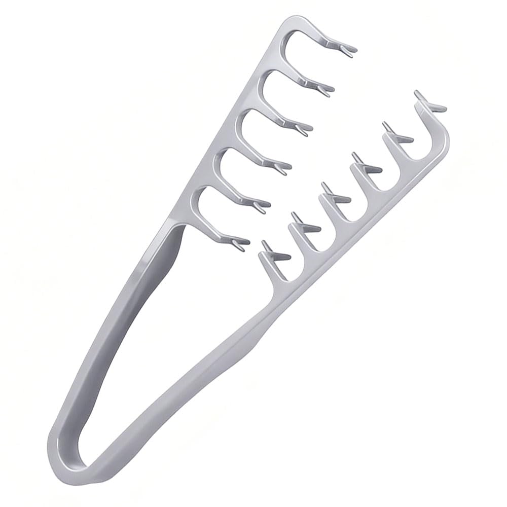 YRAKOZIN comb front view showing compact grey design and dual teeth for quick volume