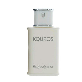 Yves Saint Laurent Kouros bottle close-up highlighting spray nozzle and refined finish
