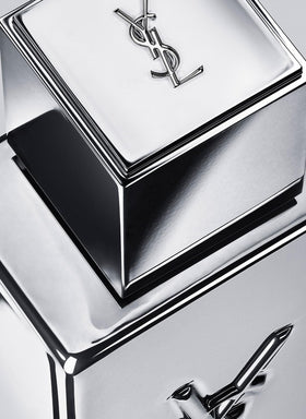 Yves Saint Laurent arranged notes with ginger bergamot and patchouli showing composition clarity