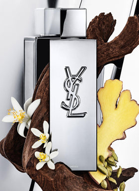 Yves Saint Laurent spray action on wrist demonstrating easy application and fragrance mist