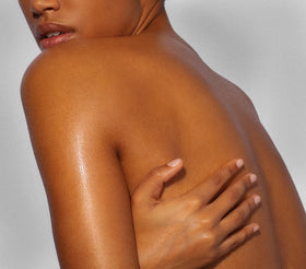 Applying Yves Rocher oil to leg, shows lightweight non-greasy hydration benefit