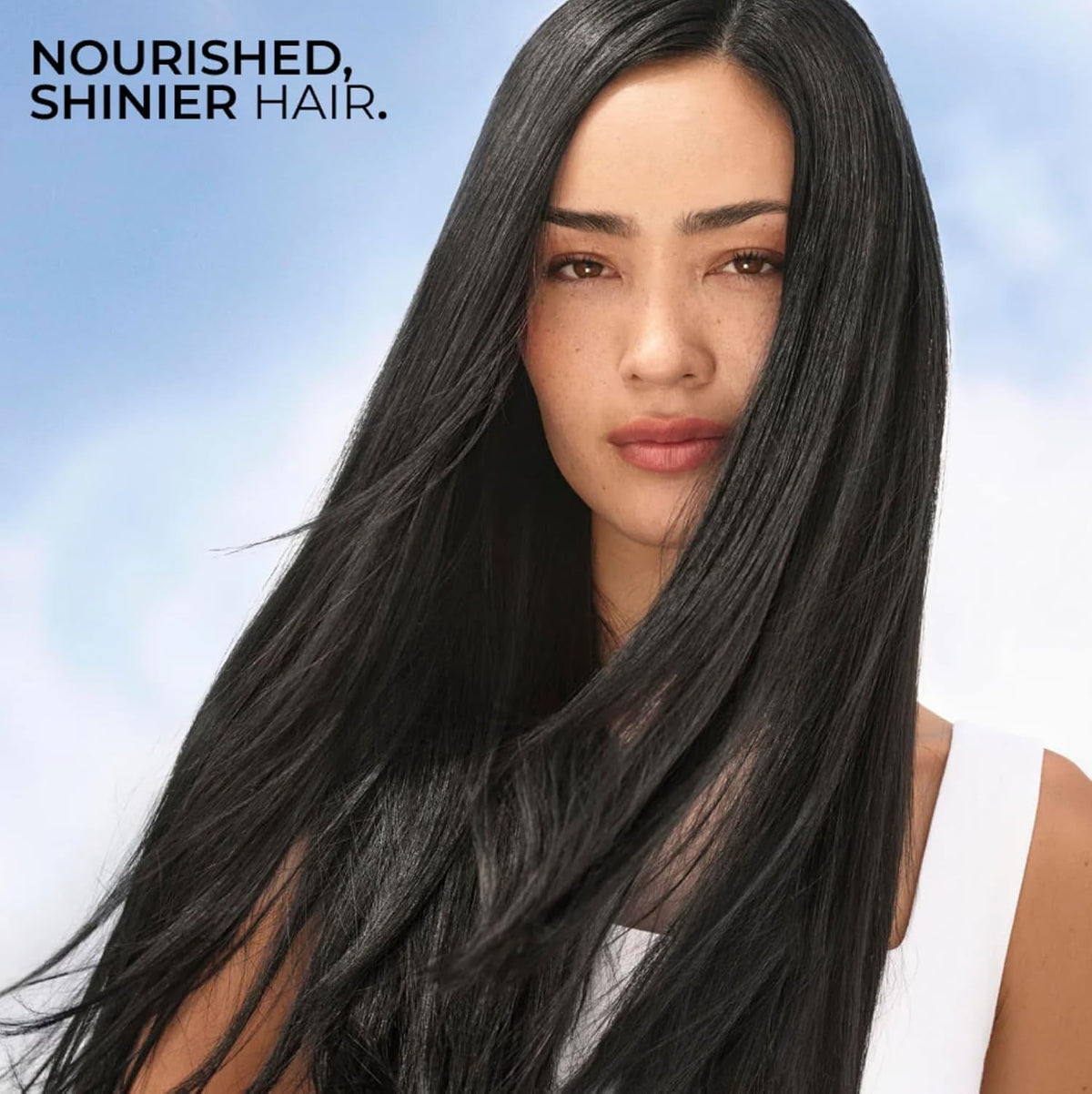 Label close-up of Yves Rocher raspberry rinse, showing natural origin and vegan benefit