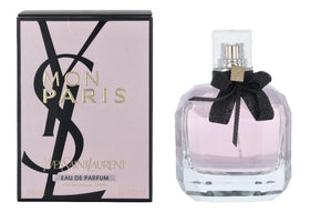 Yves Saint Laurent front bottle showing elegant glass and spray, conveys luxury