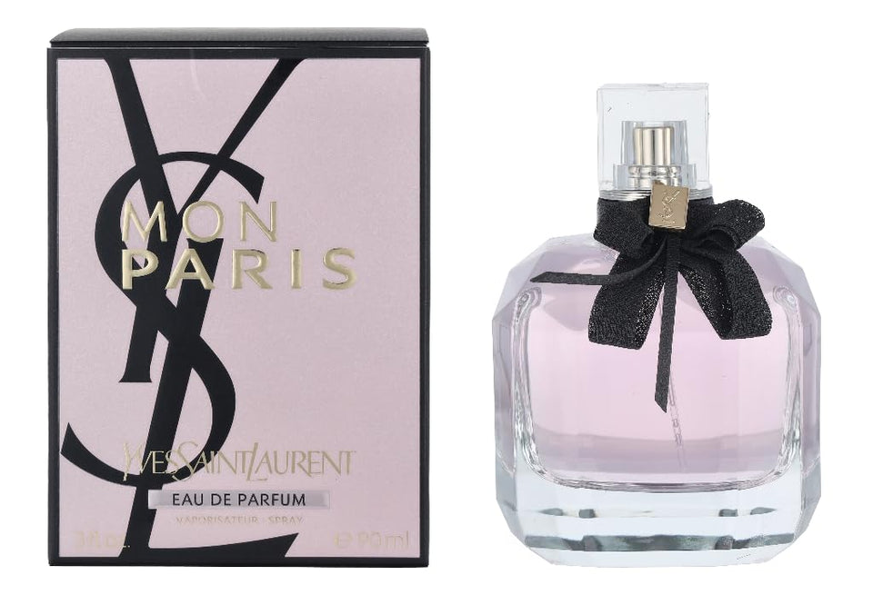 Yves Saint Laurent front bottle showing elegant glass and spray, conveys luxury