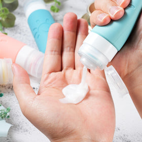 Zafit bottles packed in suitcase illustrating space-saving travel