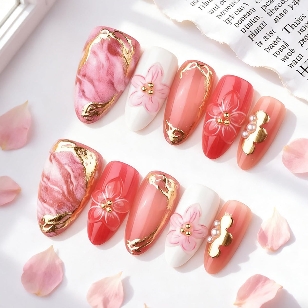 ZASKHLD close-up of 3D flower and pearl detail giving textured, decorative nails benefit