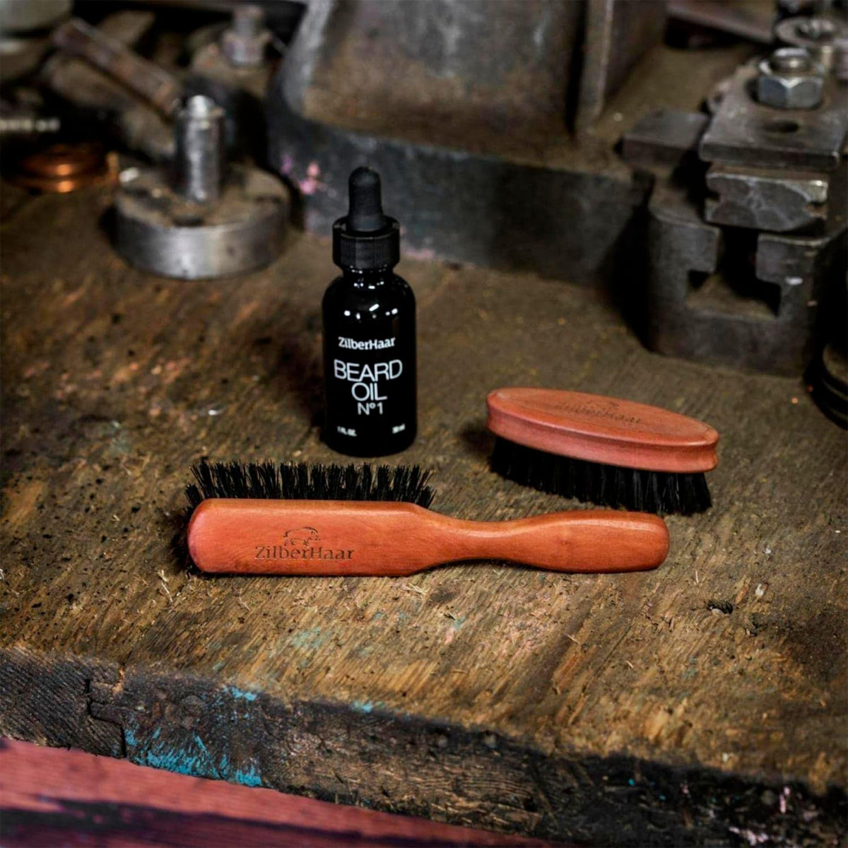 ZilberHaar brush in use with beard oil spreading product evenly for conditioned hair