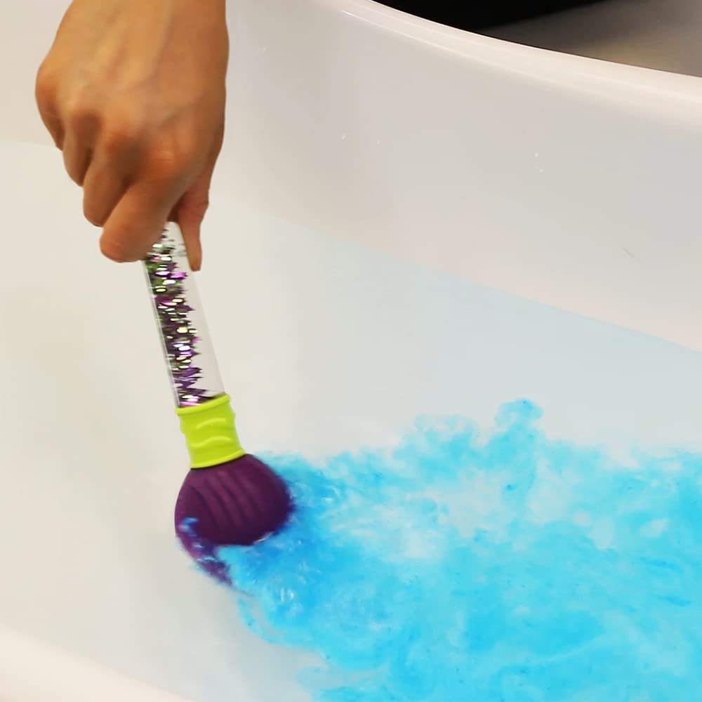 ZIMPLI child using magic brush to paint bath water, promoting creative sensory play