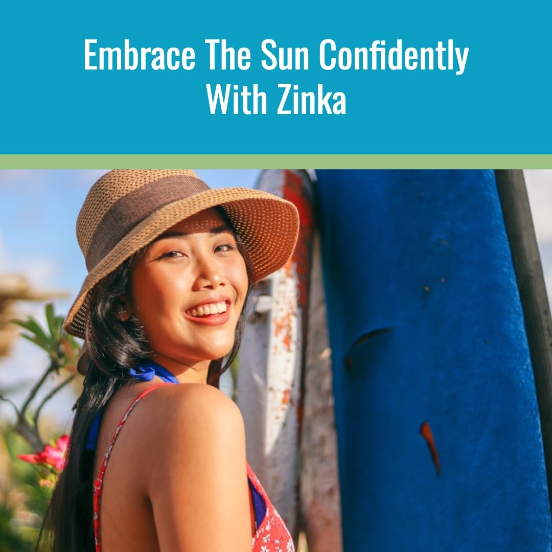 Zinka stick next to credit card showing small 0.49 oz size for travel convenience